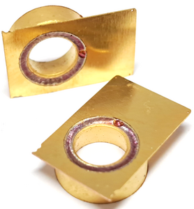 Two gold-coated copper electrical contacts by Laserline diode lasers