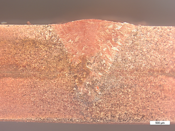 Close-up of two copper sheets welded together with an overlap weld by Laserline diode lasers